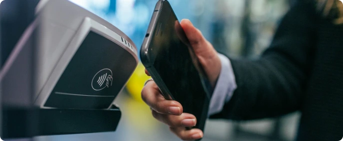 Man paying with his smartphone
